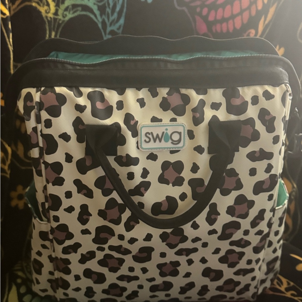 Swig Leopard Print Cooler Backpack.